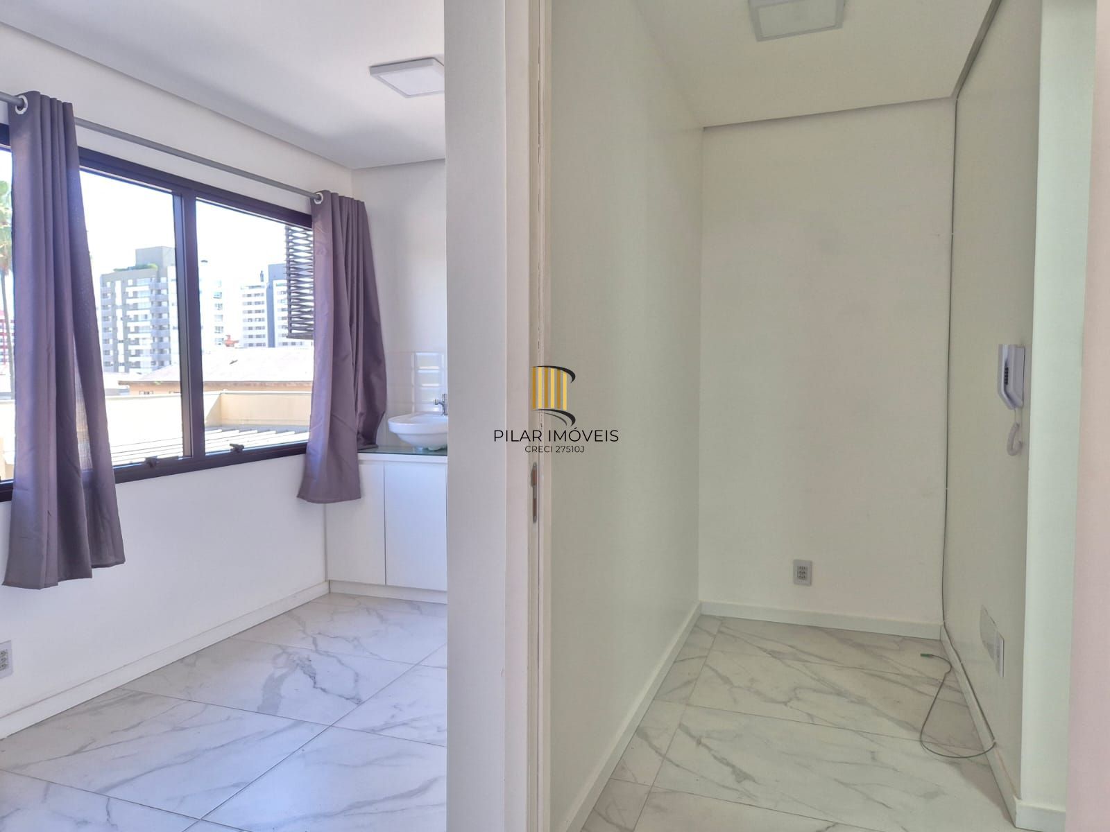 Sala reformada com box