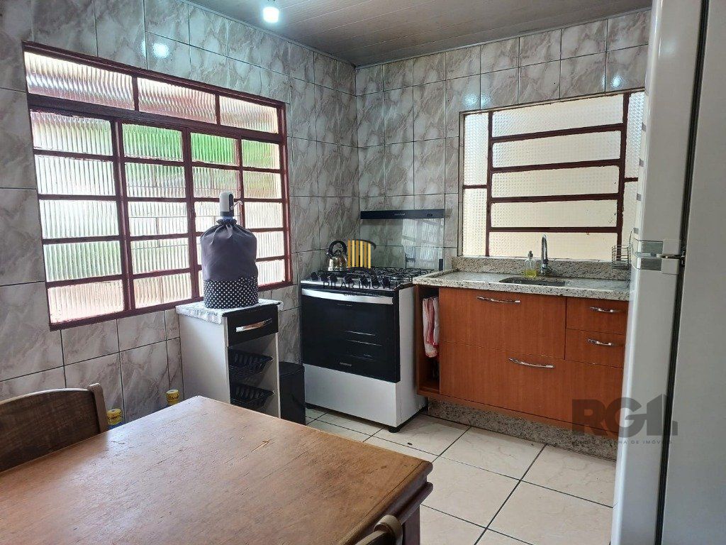 Casa térrea com salão de festas