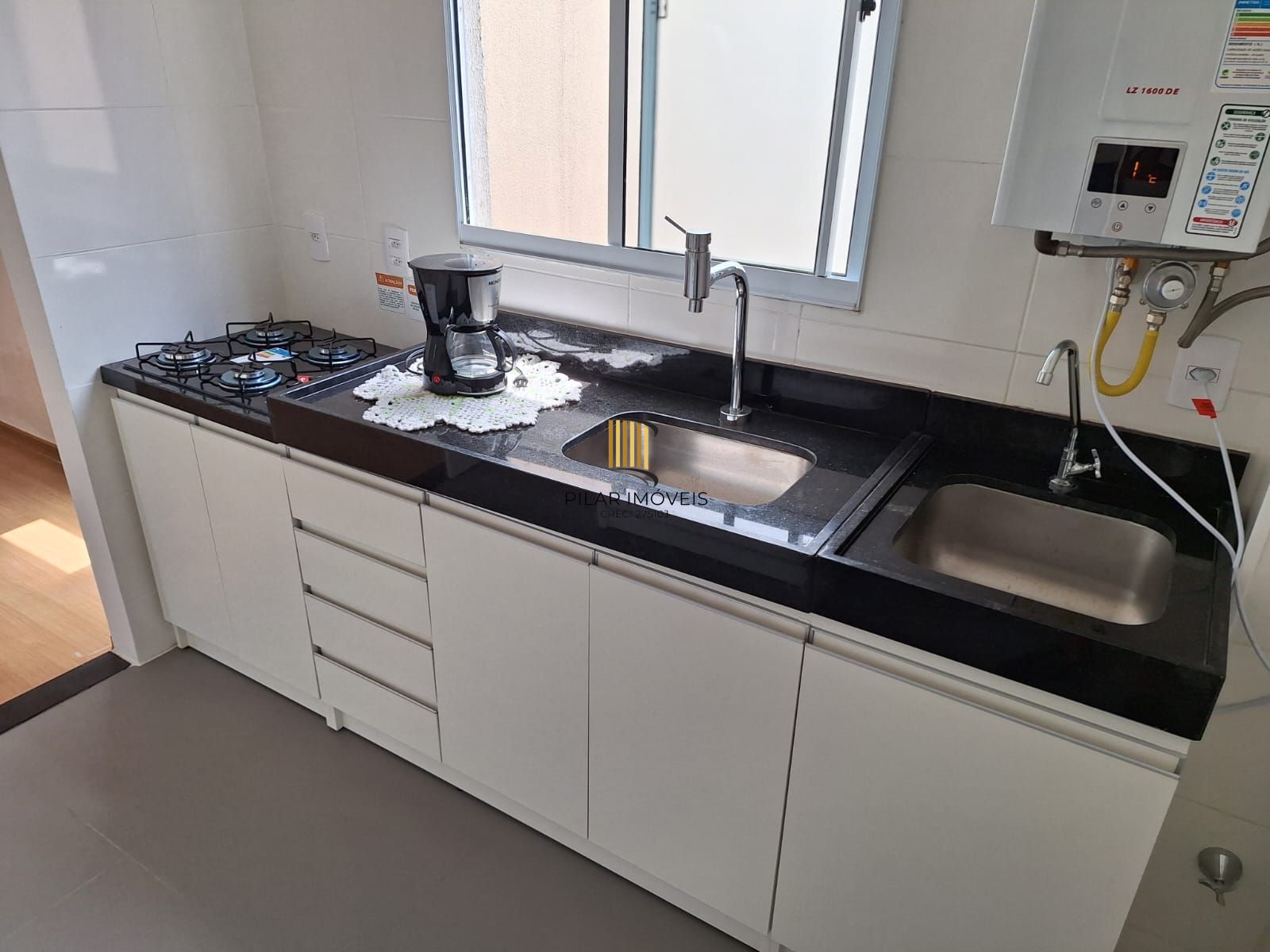 Apartamento 02 dormitorios com estacionamento privativo