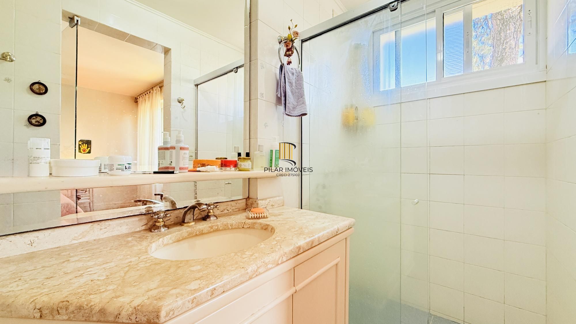 Apartamento com 3 quartos, 1 suíte,  à venda na Avenida Doutor Nilo Peçanha, 1121, Três Figueiras, Porto Alegre
