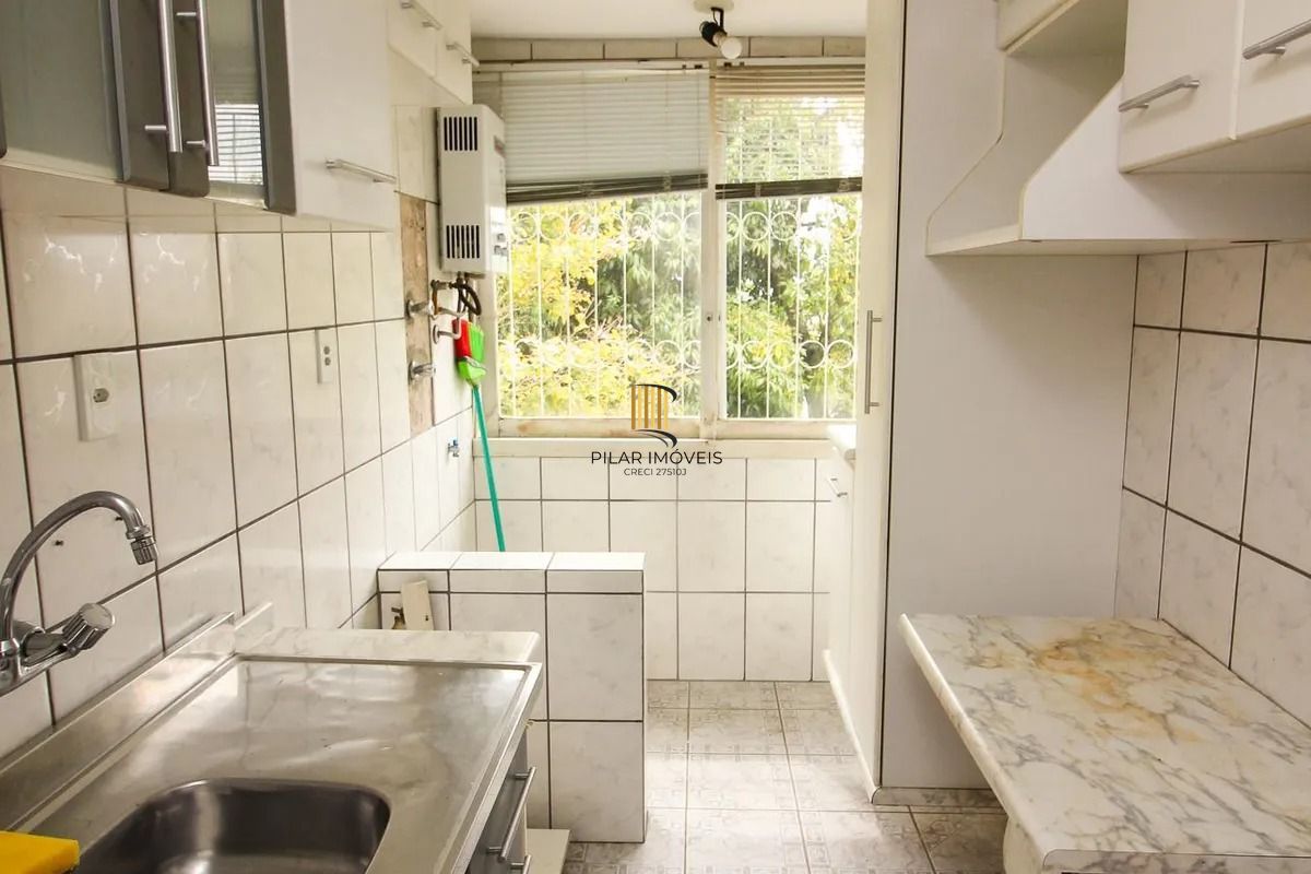 Apartamento dois dormitórios com garagem escriturada