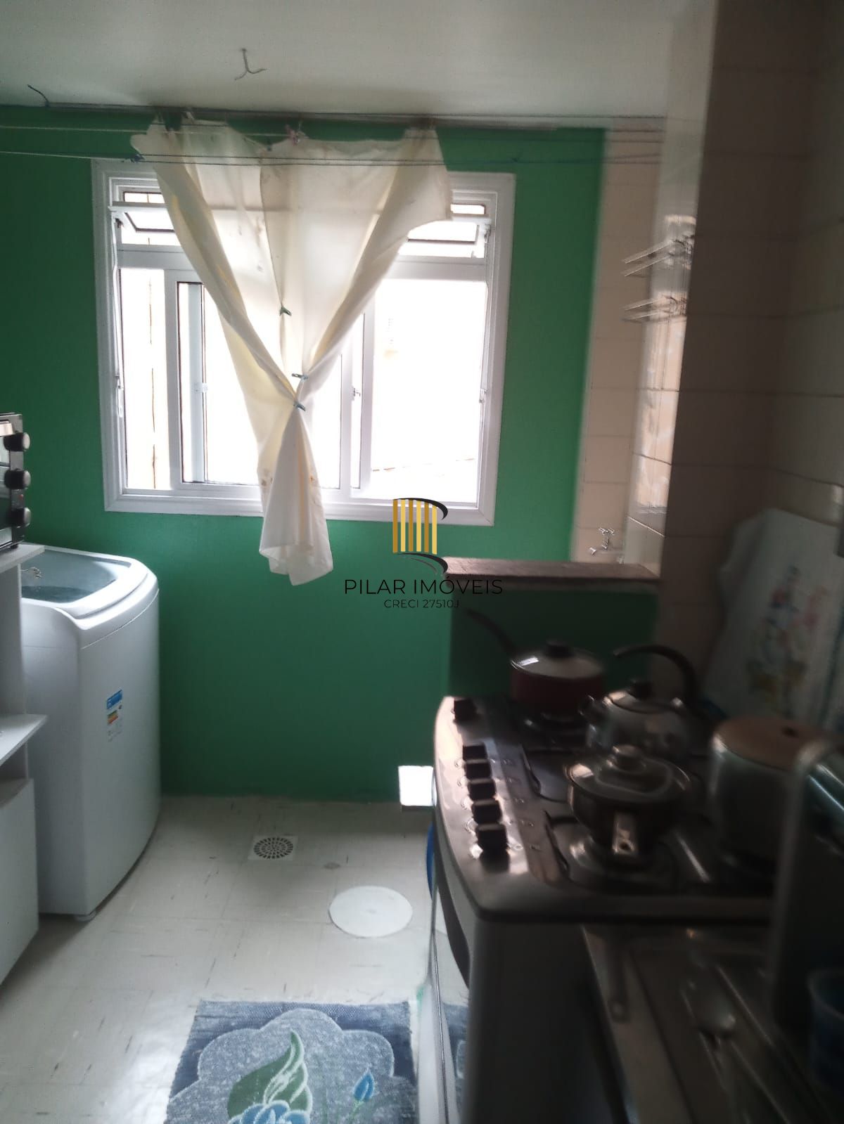 Apartamento dois dormitórios térreo com uma vaga escriturada