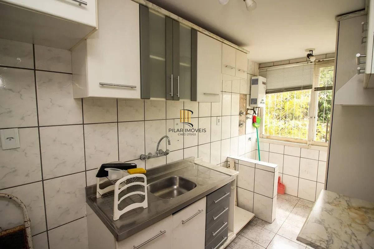 Apartamento dois dormitórios com garagem escriturada