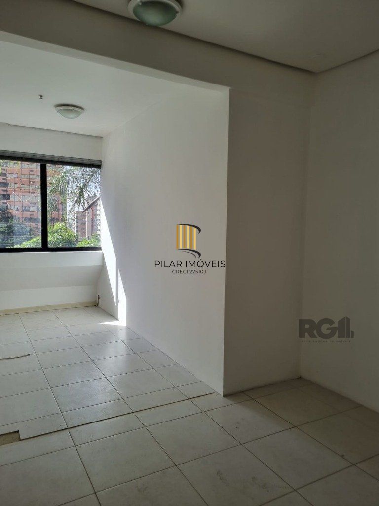 Sala com 2 ambientes e vaga