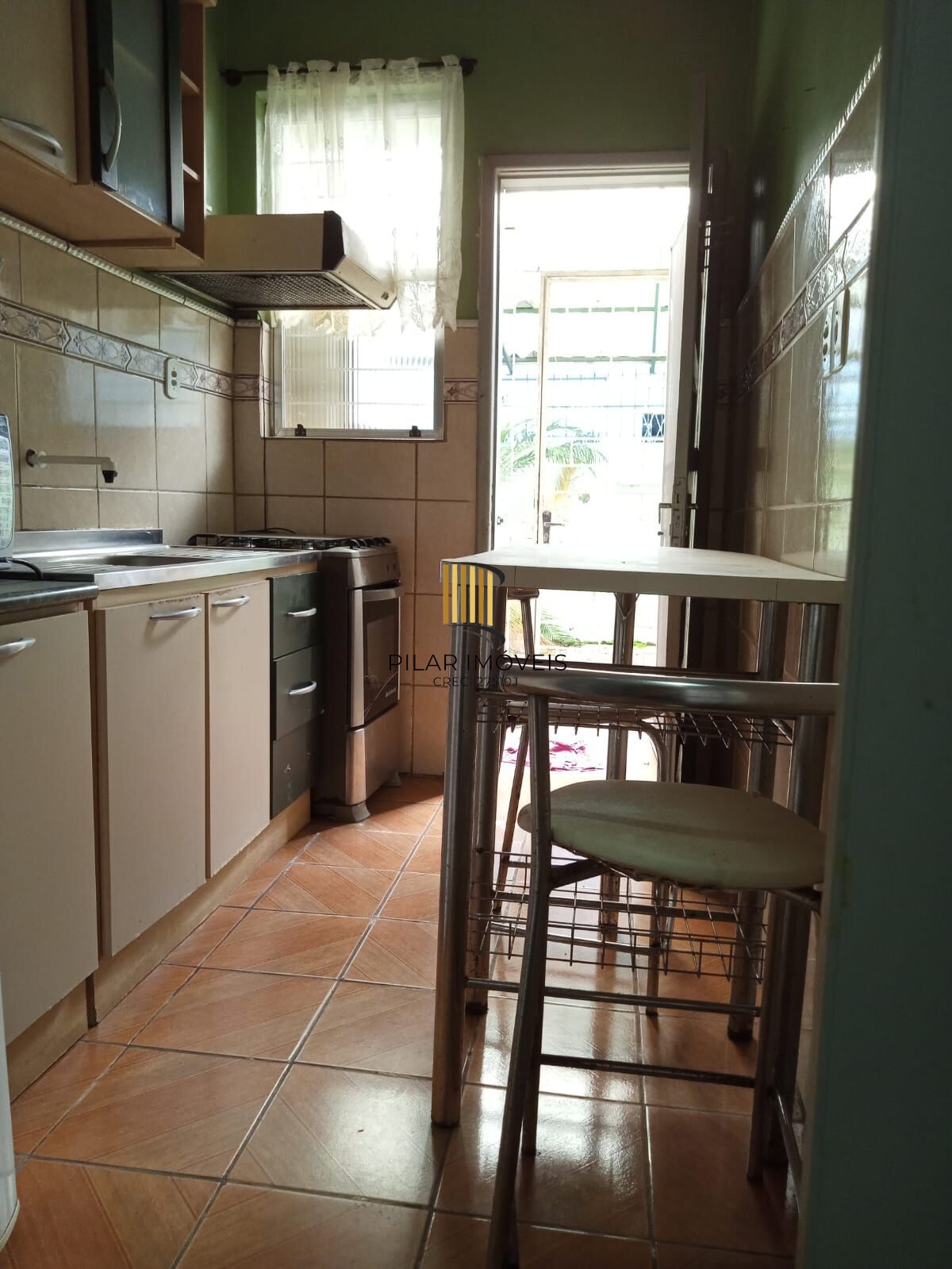 Apartamento um dormitório térreo com terraço lateral