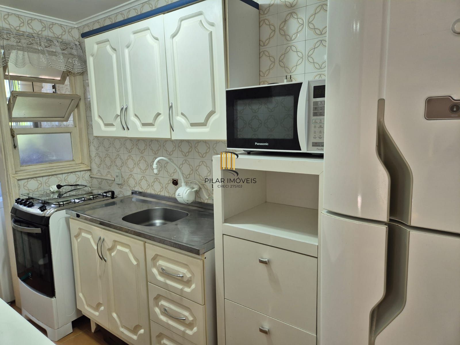 1 Dormitório, semi mobiliado com vaga