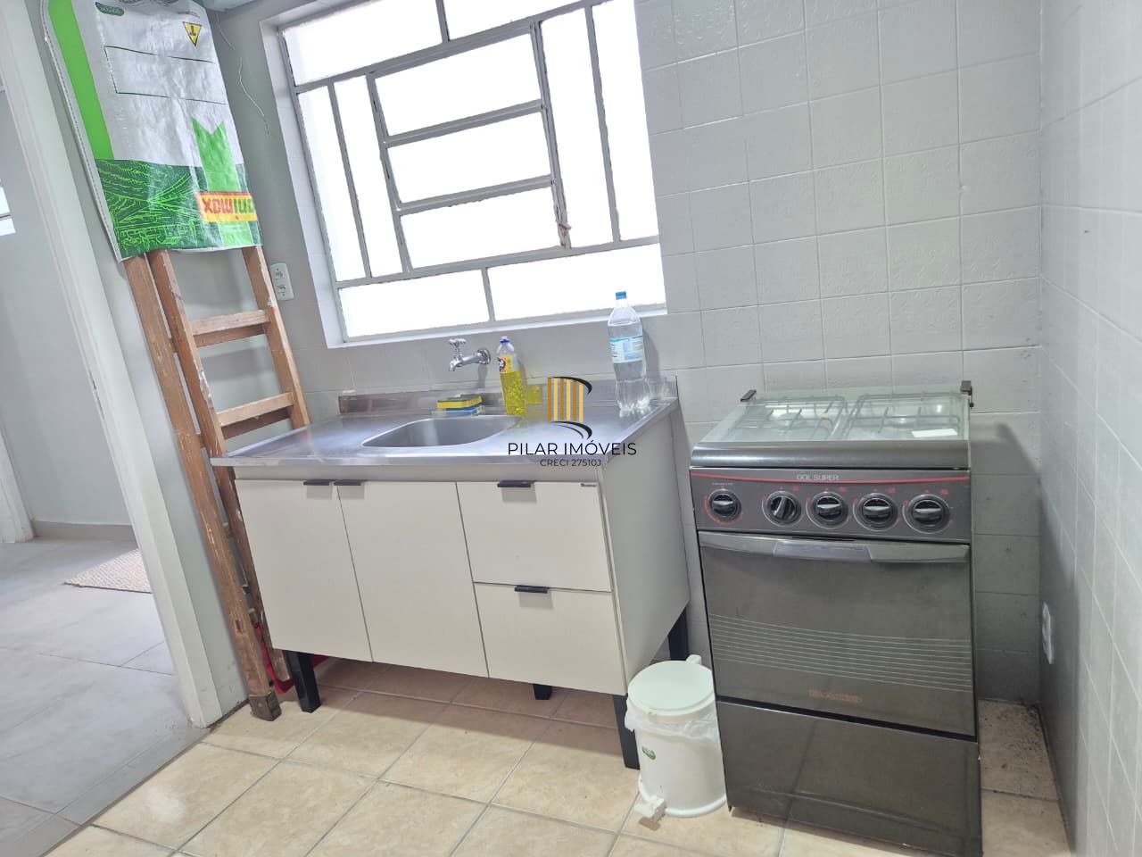 Casa comercial no miolo do bairro Menino Deus