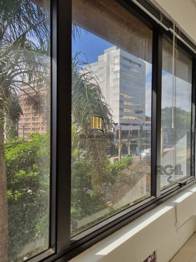 Sala com 2 ambientes e vaga