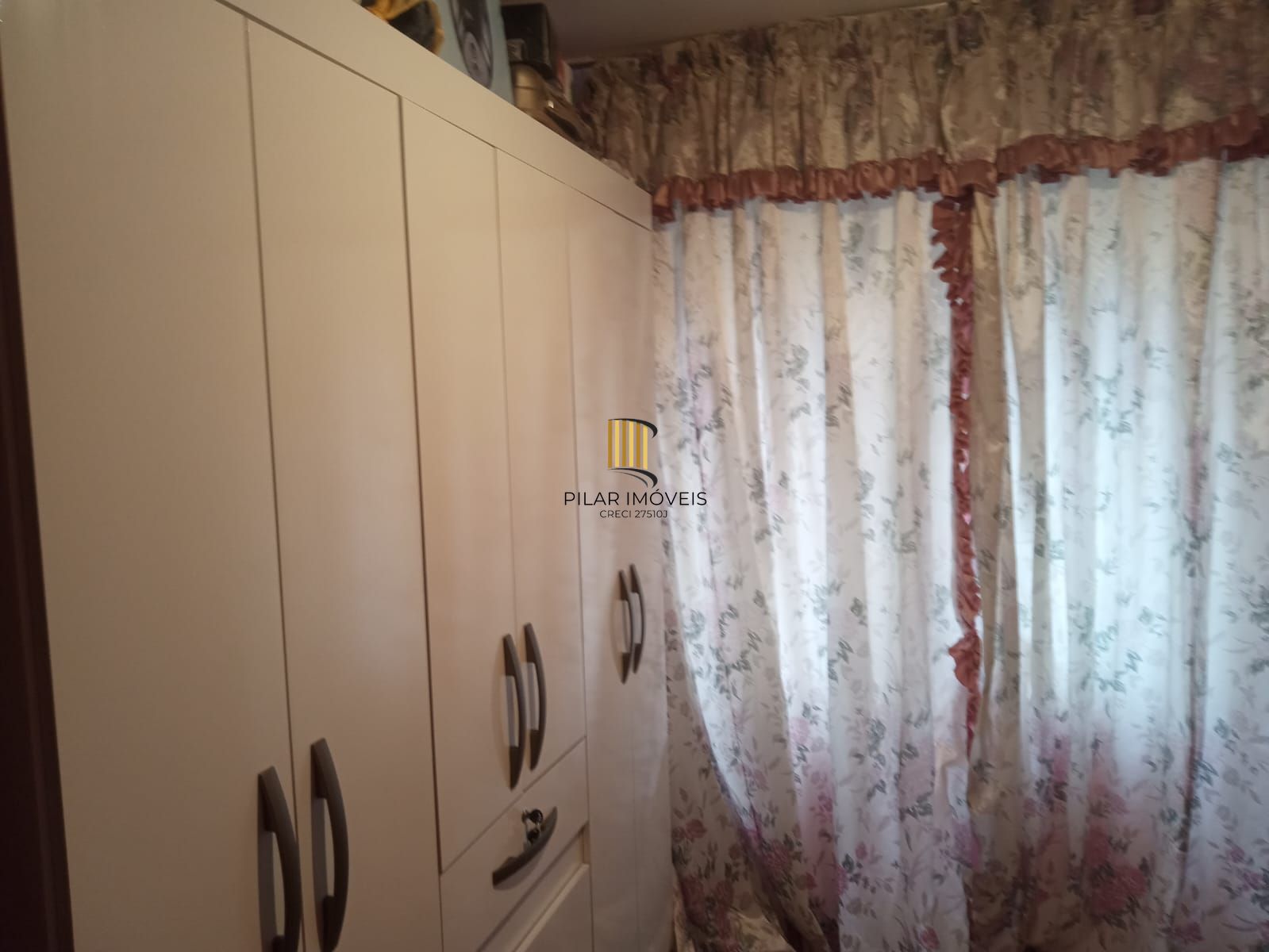 Apartamento dois dormitórios térreo com uma vaga escriturada