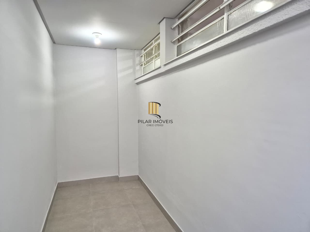 Casa comercial no miolo do bairro Menino Deus