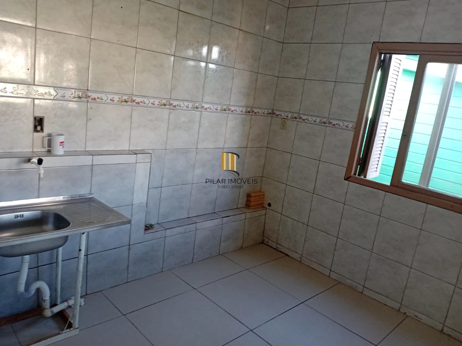 Casa 3 dormitórios no bairro Partenon