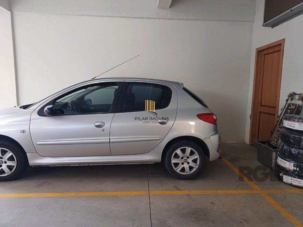 Sala de frente com vaga