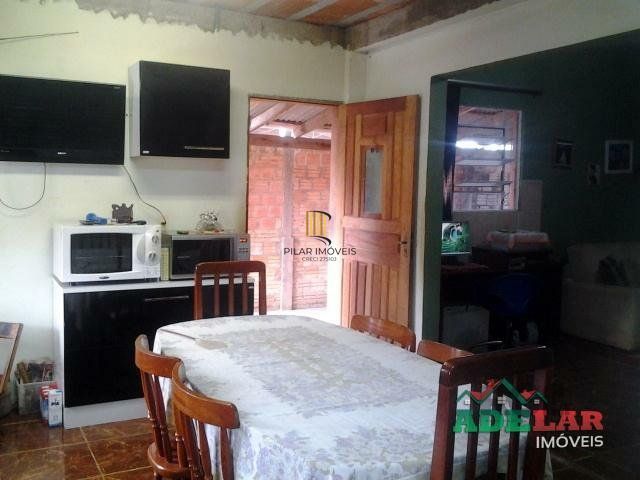 Casa 4 dormitórios no bairro Restinga