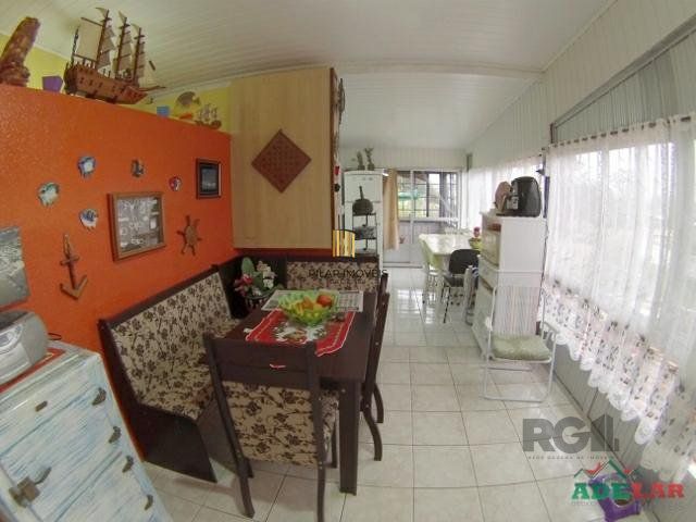 Casa 4 dormitórios no bairro Itapuã