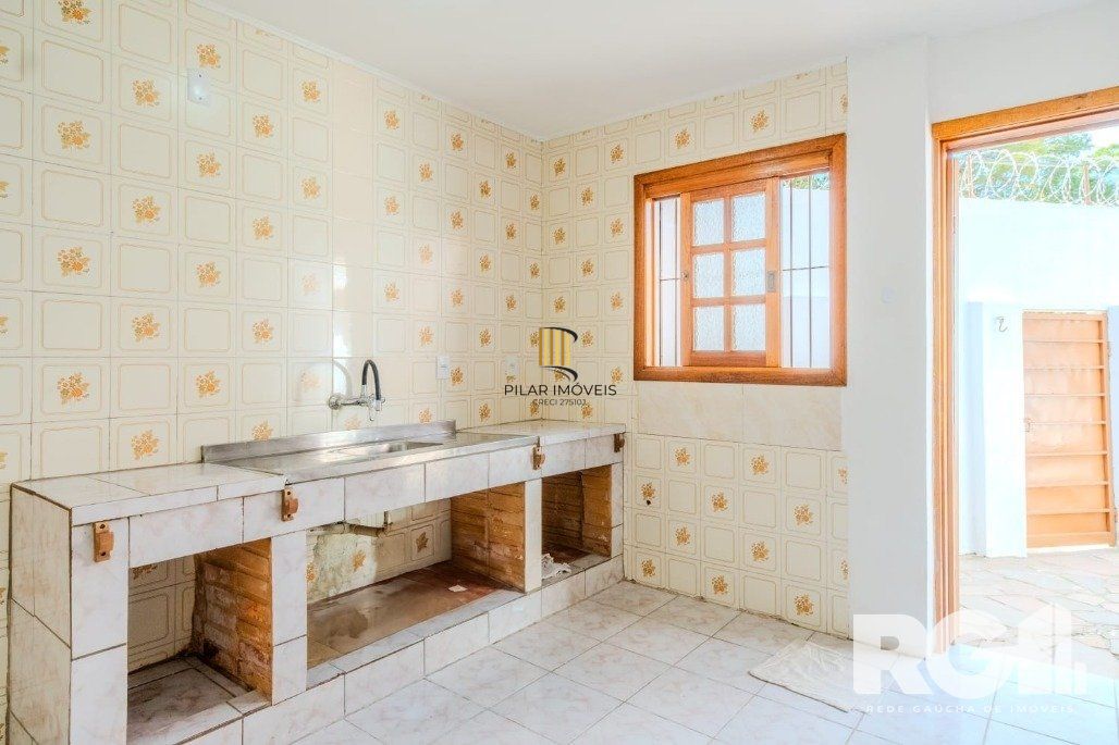 Casa 3 dormitórios no bairro Guarujá