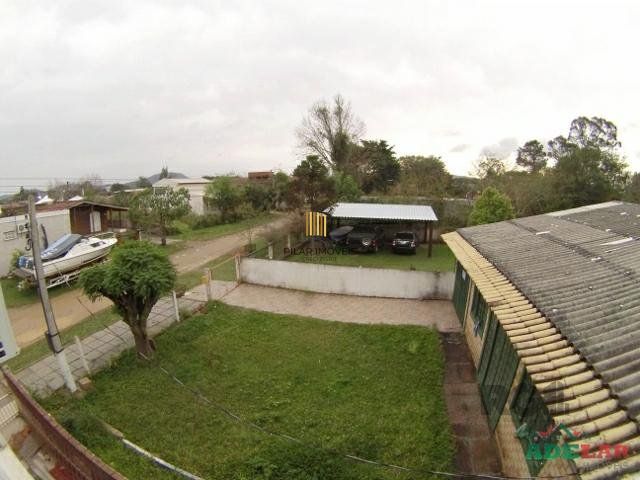 Casa 4 dormitórios no bairro Itapuã
