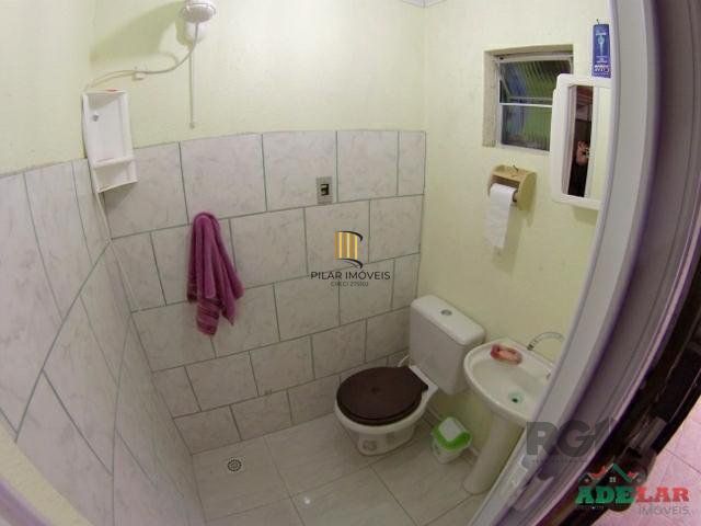 Casa 4 dormitórios no bairro Itapuã