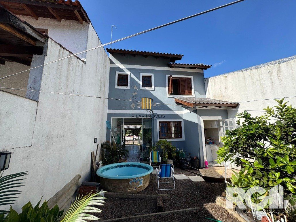 Casa 3 dormitórios no bairro Hípica