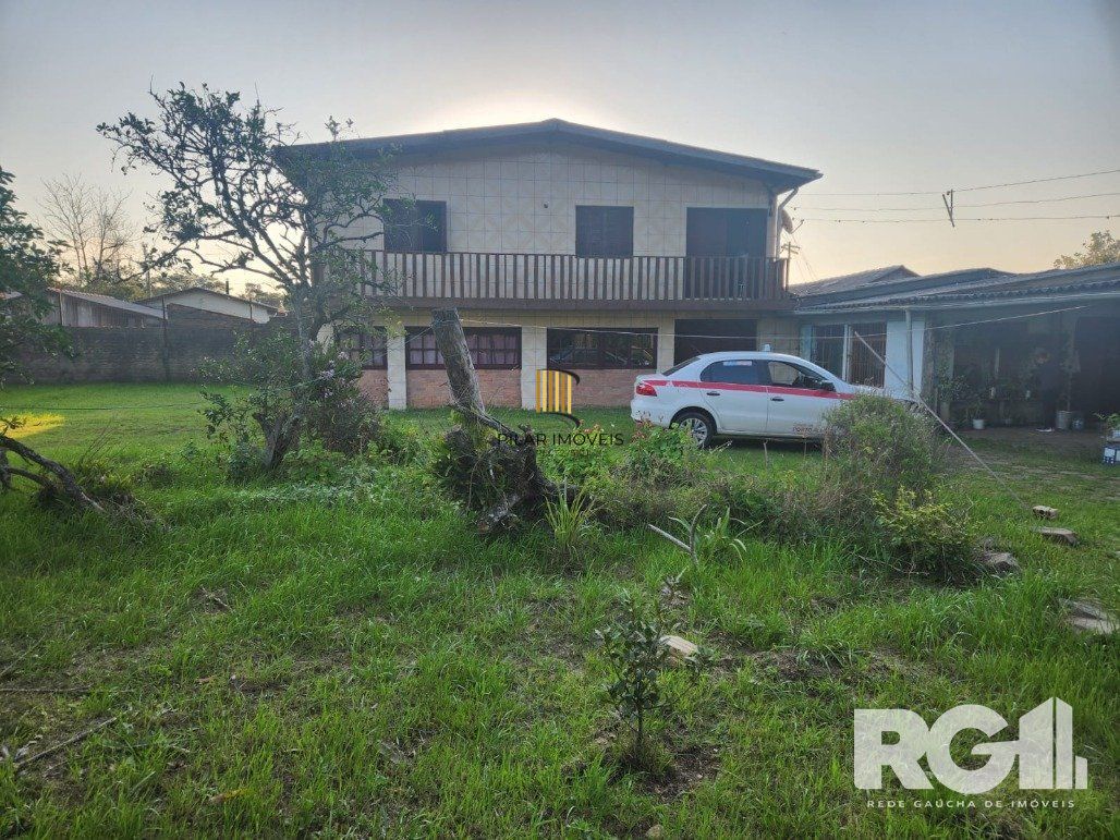 Casa 5 dormitórios no bairro Lami