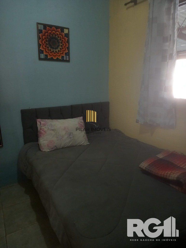 Casa 3 dormitórios no bairro Lami