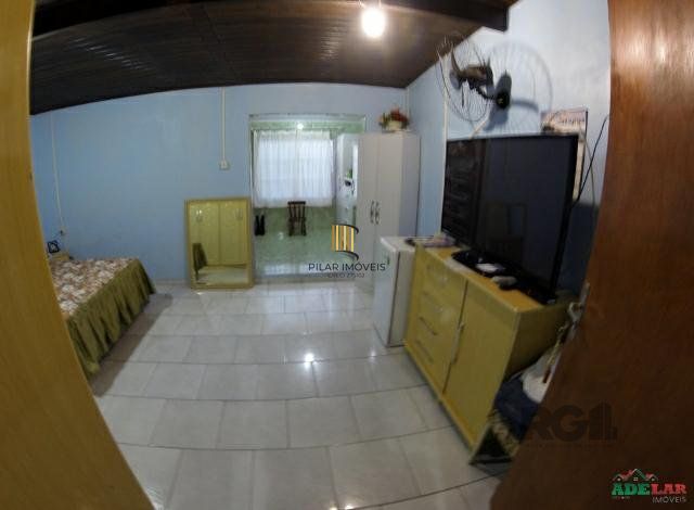 Casa 4 dormitórios no bairro Itapuã