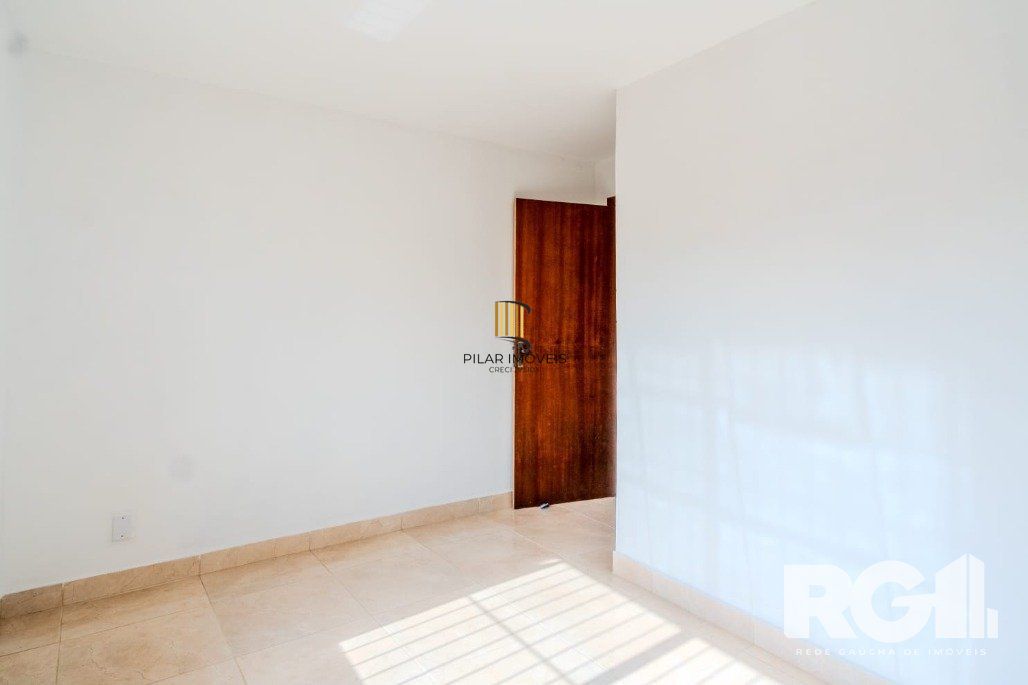 Casa 3 dormitórios no bairro Guarujá