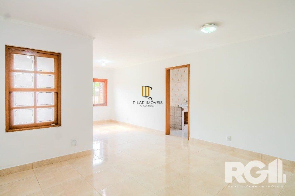 Casa 3 dormitórios no bairro Guarujá