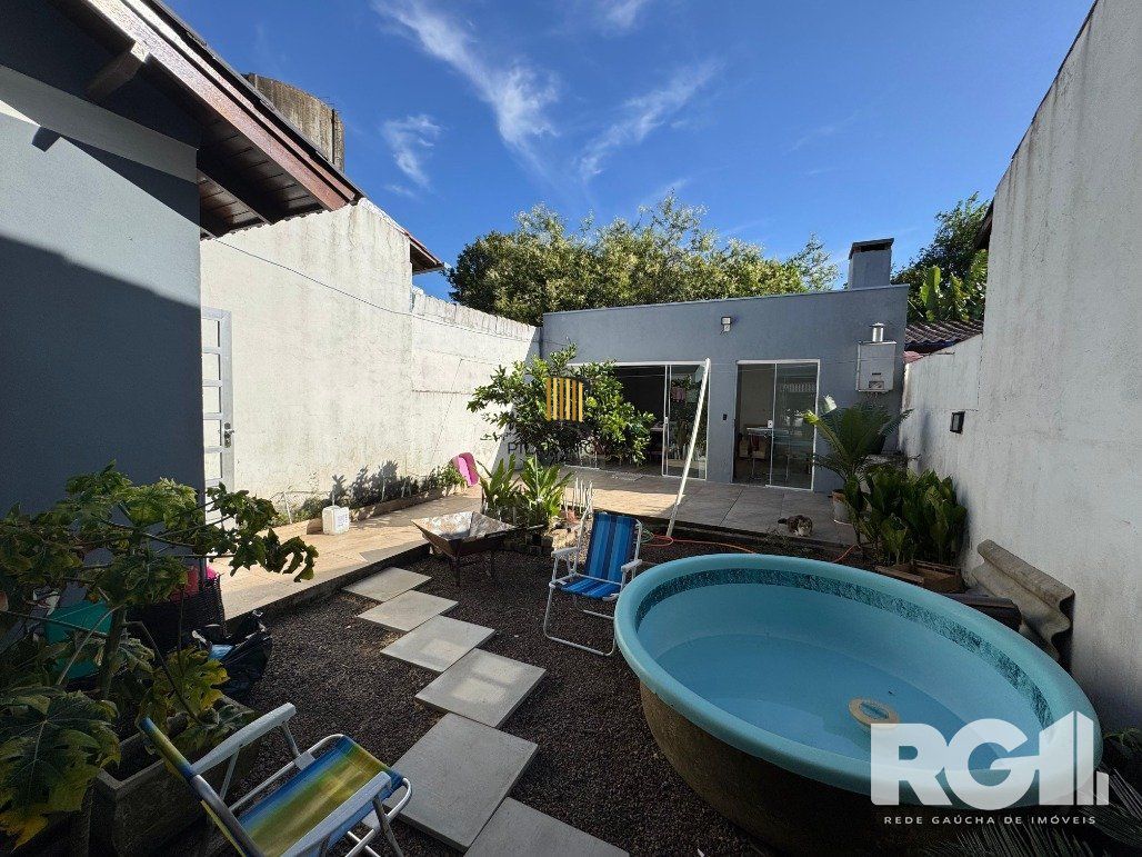 Casa 3 dormitórios no bairro Hípica