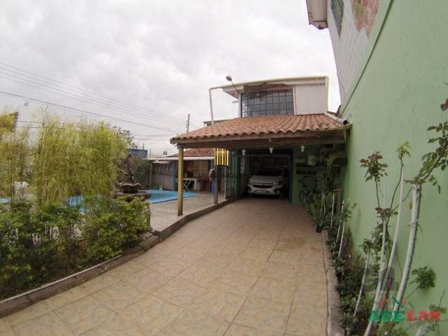 Casa 4 dormitórios no bairro Itapuã
