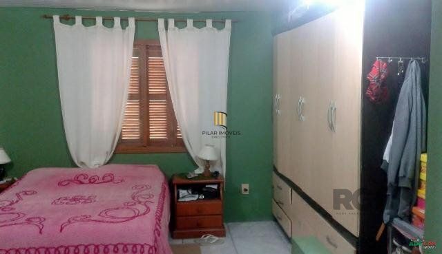 Casa 4 dormitórios no bairro Restinga