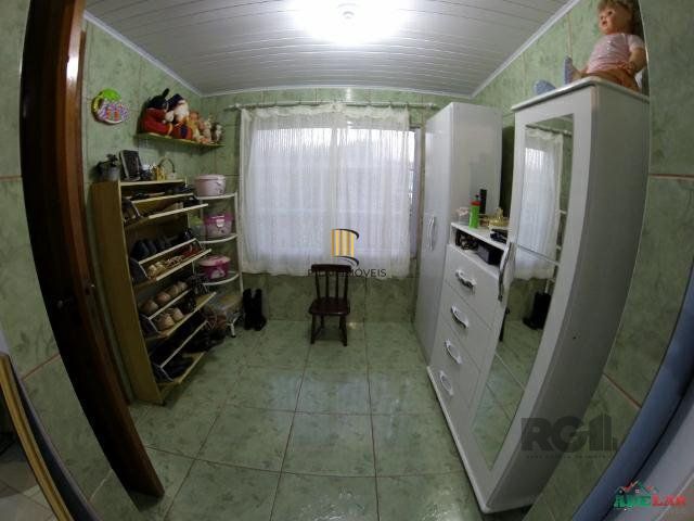 Casa 4 dormitórios no bairro Itapuã