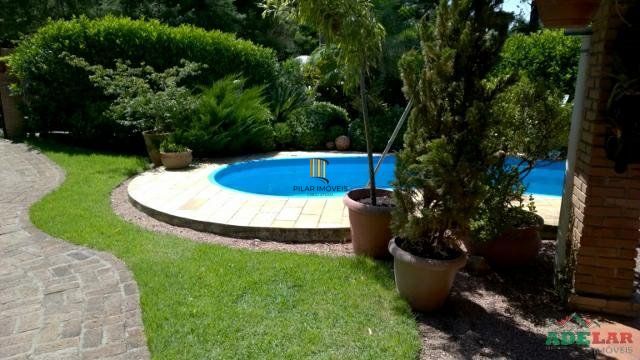 Casa 4 dormitórios no bairro Hípica