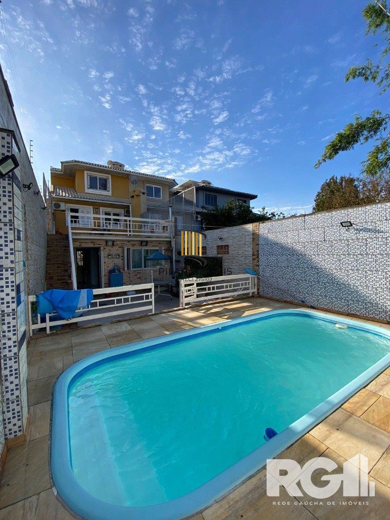 Casa 4 dormitórios no bairro Ipanema
