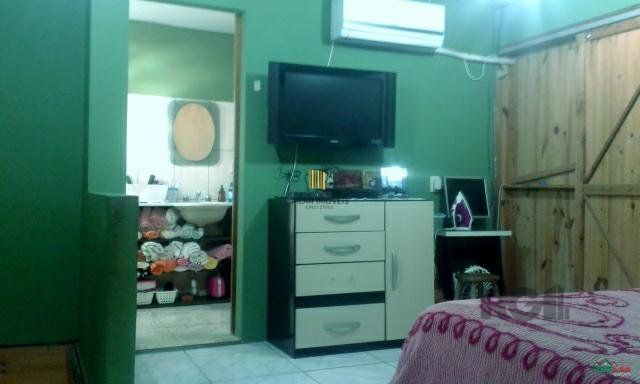Casa 4 dormitórios no bairro Restinga
