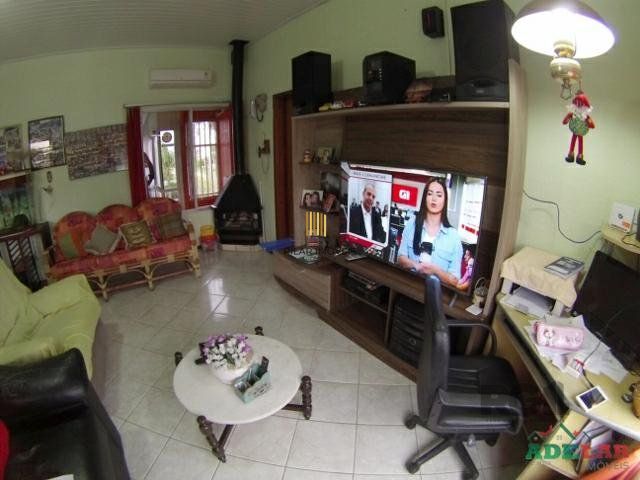Casa 4 dormitórios no bairro Itapuã