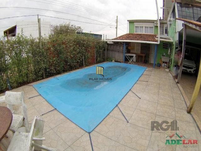 Casa 4 dormitórios no bairro Itapuã