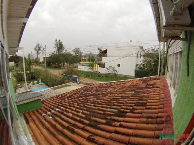 Casa 4 dormitórios no bairro Itapuã