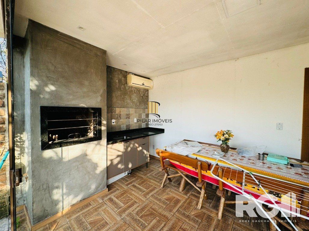 Casa 3 dormitórios no bairro Lami