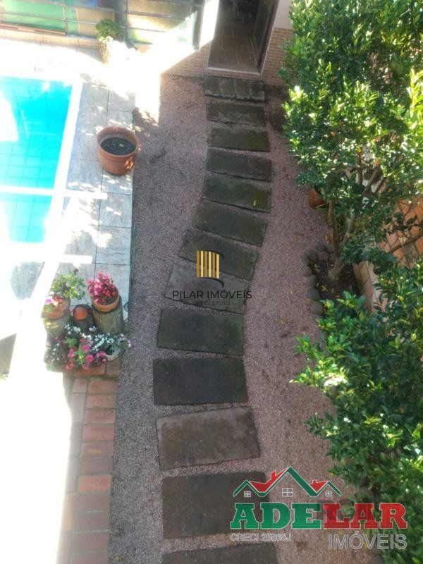 Casa 4 dormitórios no bairro Restinga