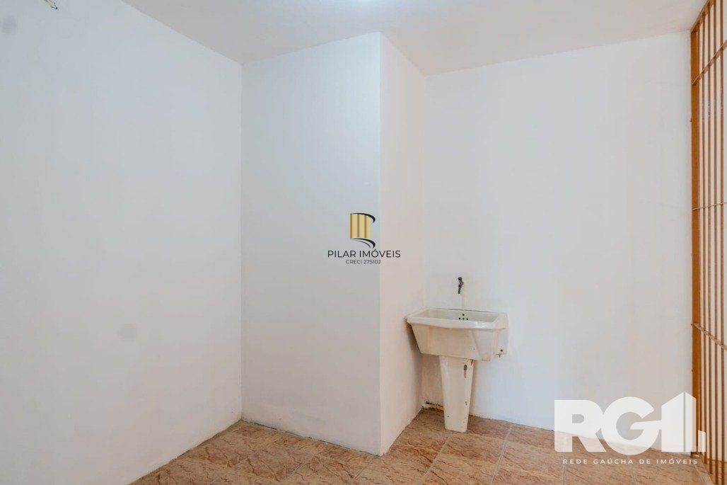 Casa 3 dormitórios no bairro Guarujá