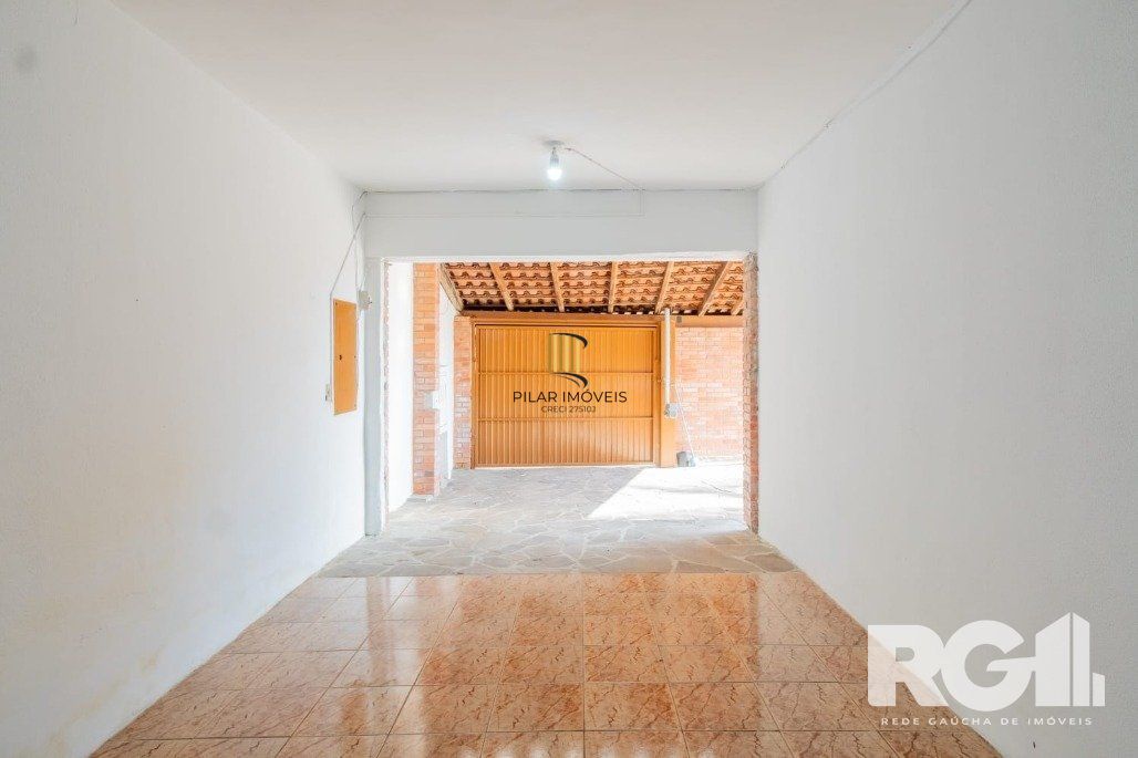 Casa 3 dormitórios no bairro Guarujá