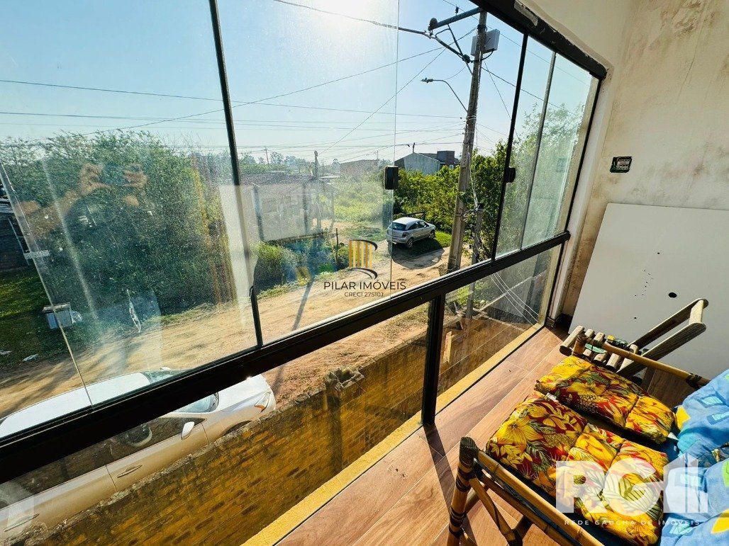 Casa 3 dormitórios no bairro Lami