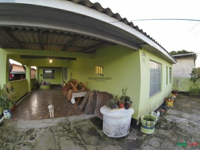 Casa 4 dormitórios no bairro Itapuã - Pilar Imóveis