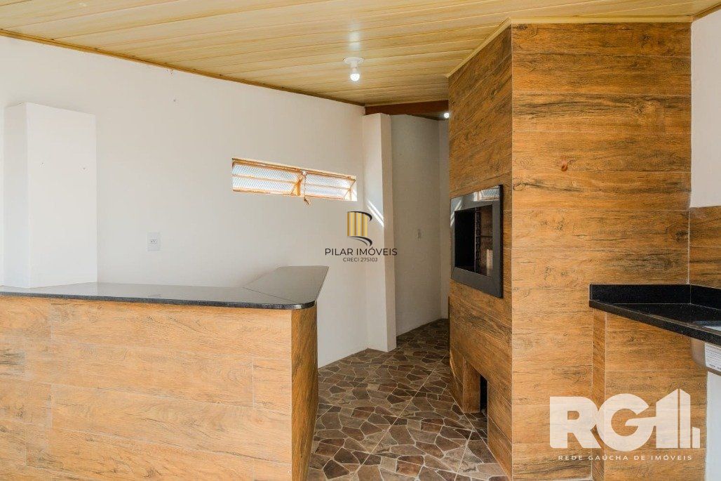 Casa 3 dormitórios no bairro Guarujá