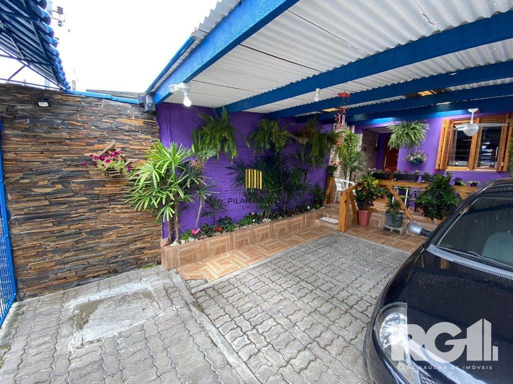 Casa 3 dormitórios no bairro Hípica
