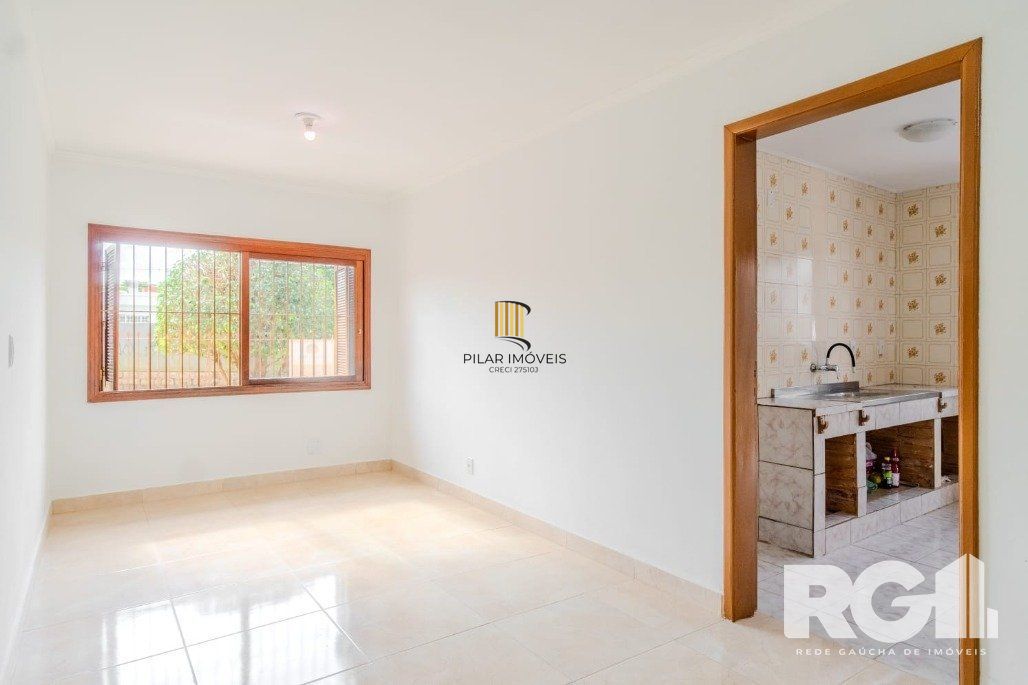 Casa 3 dormitórios no bairro Guarujá