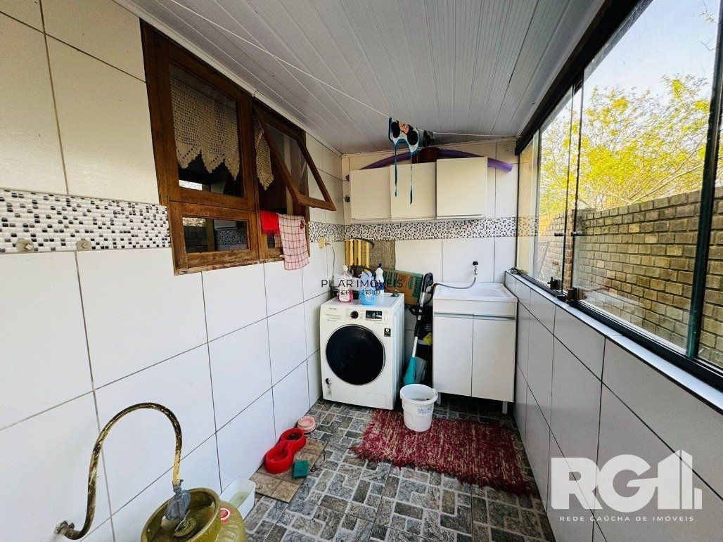 Casa 3 dormitórios no bairro Lami