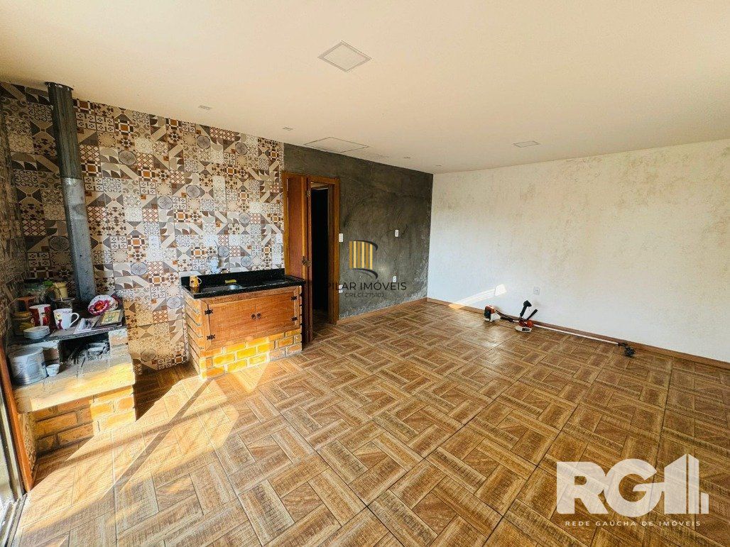 Casa 3 dormitórios no bairro Lami