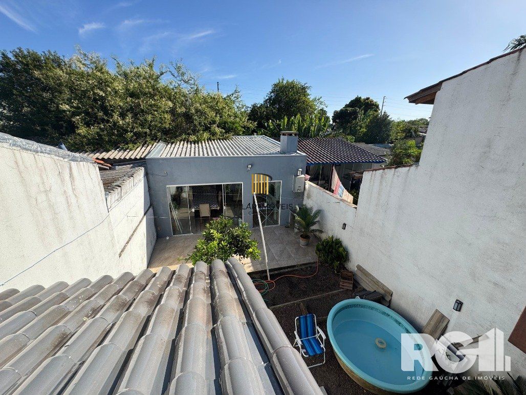 Casa 3 dormitórios no bairro Hípica