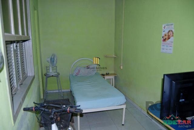 Casa 4 dormitórios no bairro Itapuã